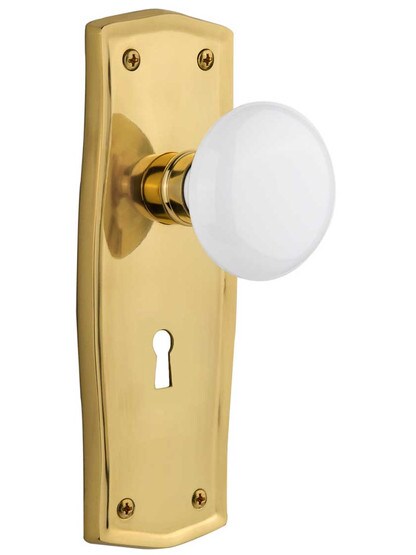 Prairie Style Door Set With White Porcelain Door Knobs in Un-Lacquered Brass .